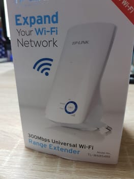 HEILIGENHAUS, NRW, GERMANY - DECEMBER 16, 2018:. TP-Link TL-WA850RE WLAN Repeater with 300 Mbps, WLAN amplifier, App control, Ethernet port, WPS, AP mode, LED switchable, compatible with all WLAN devices in white