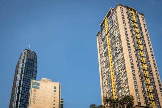 Chongqing, China -  August 2019 : High-rise commercial, business and residential skyscraper buildings in the Jiefangbei district