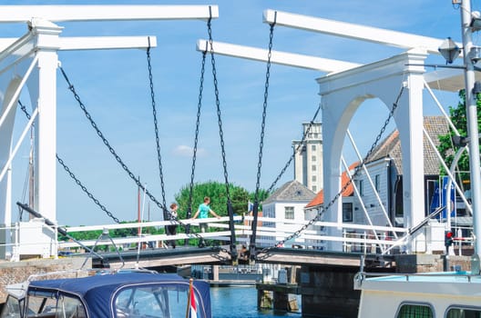 ZIERIKZEE, ZEELAND, NETHERLANDS - JUNE 15, 2015: .Double Drawbridge in Netherlands Zierikzee. Entrance to the historic port town.
