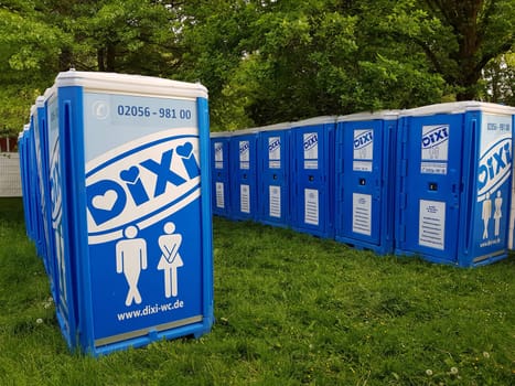 ESSEN, NRW, GERMANY - MARCH 18, 2018:..Essen, Nrw, Germany - März 18, 2018:. Dixi mobile toilet at an event venue. Dixi leases tranportabele toilet facilities for events. The toilets are cleaned regularly.