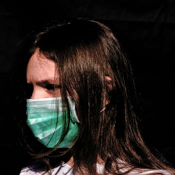 Portrait of girl wearing protective mask - London, United Kingdom