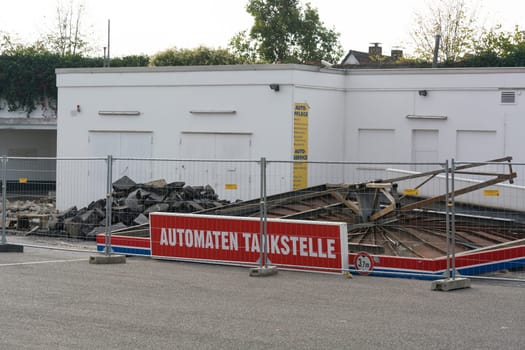 HEILIGENHAUS, NRW, GERMANY - OCTOBER 19, 2018:.Heiligenhaus, Nrw, Germany - October 19, 2018: .Demolition of the petrol station in Heiligenhaus behind the Real supermarket