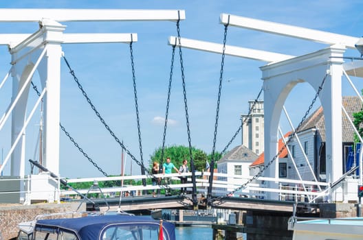 ZIERIKZEE, ZEELAND, NETHERLANDS - JUNE 15, 2015: .Double Drawbridge in Netherlands Zierikzee. Entrance to the historic port town.