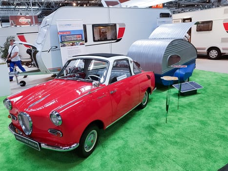 DUESSELDORF, NRW, GERMANY - AUGUST 29, 2018:.Duesseldorf, Nrw, Germany - August 29, 2018:.Motorhomes and campers for sale or rent at an exhibition. Concept freedom, family vacation trip, holiday trip with camper.