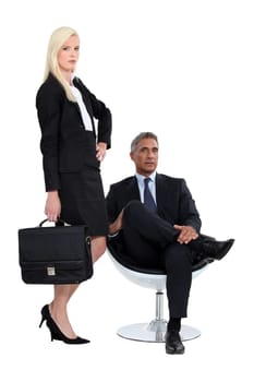Studio shot of a smart business duo