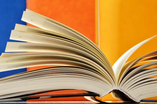 Composition with hardcover books in the library