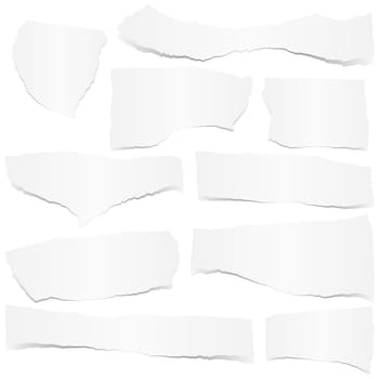collection of white colored scraps of papers with shadow