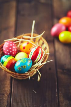 Colorful Easter eggs in basket