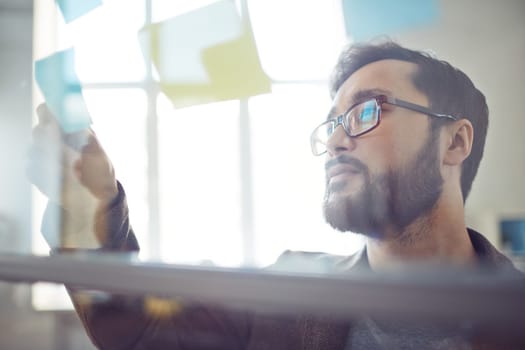 Businessman looking at his notes