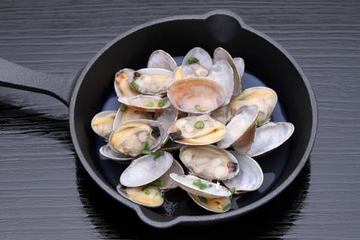 Japanese traditional cuisine, Sake steamed clams, Sakamushi, on table