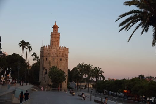 Seville, Spain - June 9 2019: sunset view of the Torre del Oro