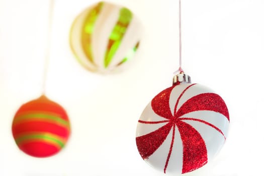 pinwheel and colorful ball mobile hanging on the ceiling