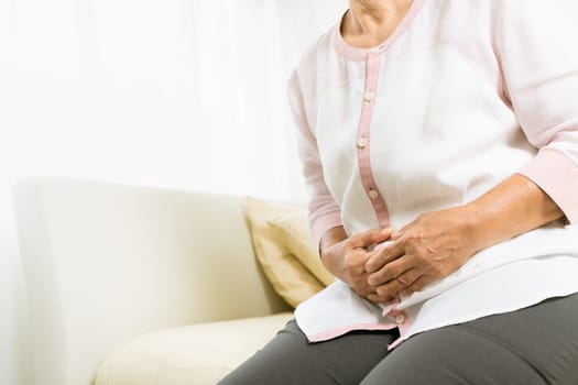 stomach pain of old woman at home, healthcare problem of senior concept