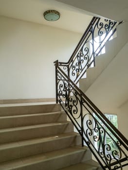 The Marble staircase with stairs in luxury hall