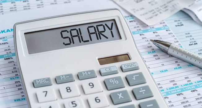 A calculator with the word Salary on the display
