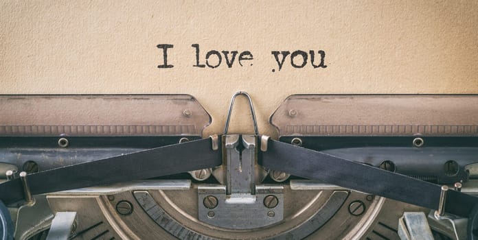 Text written with a vintage typewriter - i love you