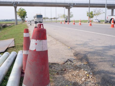 Traffic cones and " Diversion"" sign outside"