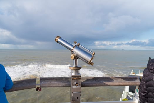 coin operated observation binocular at the Dutch north sea coast