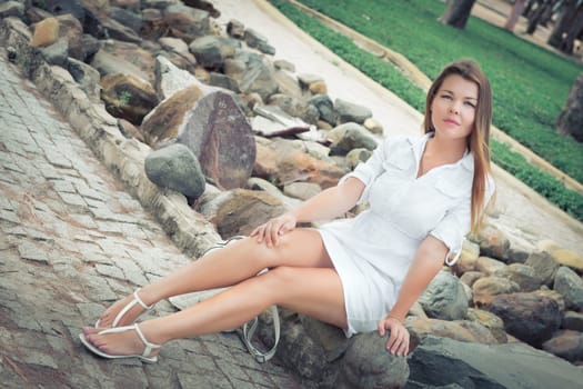 Fashion portrait of a beautiful woman outdoor. Natural beauty