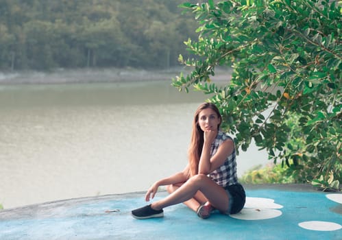 Fashion portrait of a beautiful woman outdoor. Natural beauty