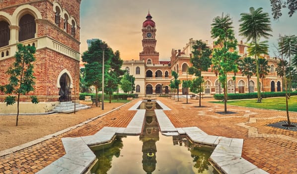 Sunset view from pedestrian bridge of Sultan Abdul Samad Building at Merdeka square, Kuala Lumpur, Malaysia. Panorama