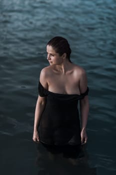 Portrait of a beautiful sexy woman outdoor. Model near the sea