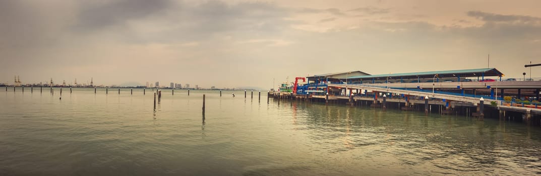 Georgetown coastline at sunset time, Penang, Malaysia. Panorama