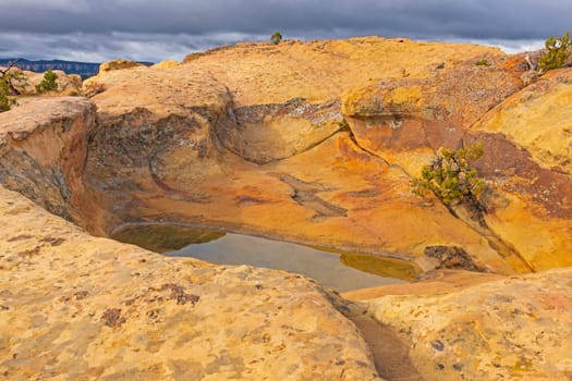 Pot hole Pond on a Sandstone Ridge in El Malpais National Monument in New Mexico