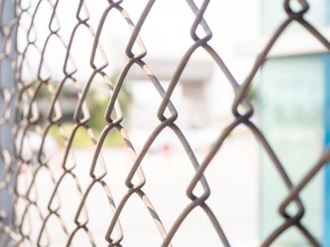 Wire fencing beside each other, the line between the road