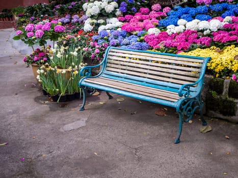table and chairs standing on a lawn at the garden
