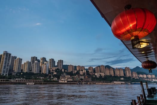 A shot of the city skyline, Yangtze river and Chinese red lanterns, China