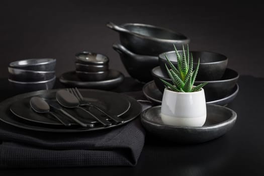 Dishes in minimalistic black design. Pure black.