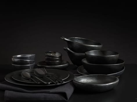 Dishes in minimalistic black design. Pure black.