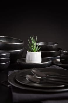 Dishes in minimalistic black design. Pure black.