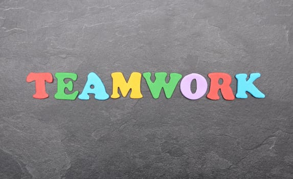 Term from colorful letters on slate board
