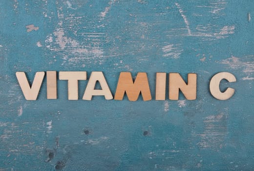 Term from wooden letters on weathered concrete