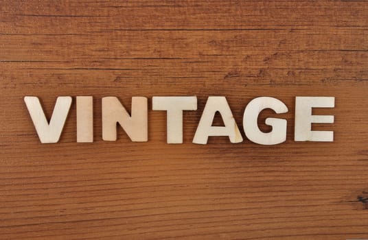 Term from wooden letters on old wooden board