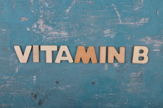 Term from wooden letters on weathered concrete