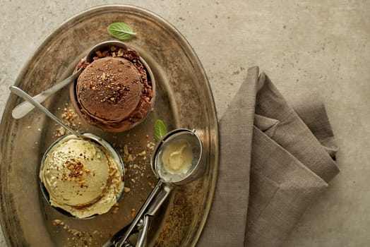 Set of ice cream scoops with chocolate and vanilla flavours close up