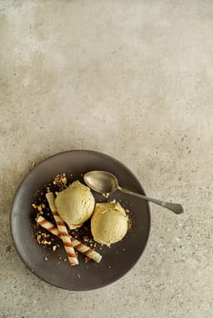 Homemade Organic Vanilla soft Ice Cream scoops with two wafer straws