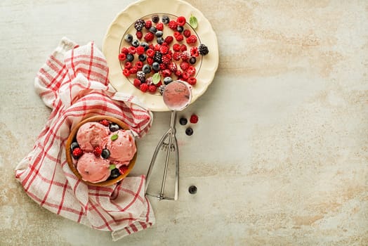 Fresh of soft ice cream or frozen yogurt with berry fruit flavours