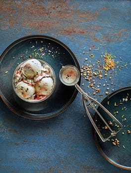 Set of soft ice cream scoops or frozen yogurt of mixed flavours with berries and fruits