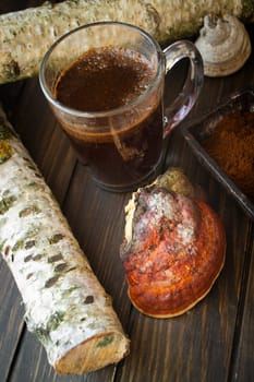 Vertical composition of organic Chaga and polypore mushrooms and coffee of mushrooms.