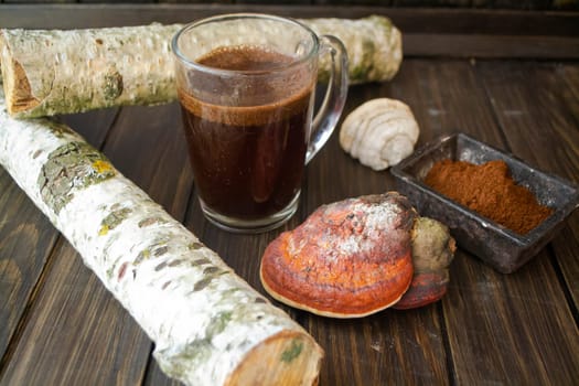 Concept of modern food industry. Mushroom coffee from mushrooms Chaga and polypore