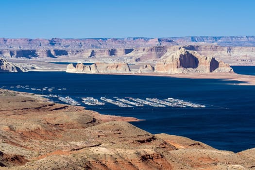 Lake Powell in desert Landscape and yacht Marinas recreation center at Page city Arizona, United States. USA Landmark environmental water resources reservoir sport and recreation concept.