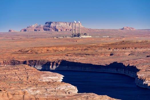 Power plant Generating Station Electricity with colorado river and lake powell landscape generating in Navajo Page Arizona United States. USA Landmark environmental and electricity concept.