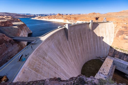 Glen Canyon Dam with Lake Powell in the Desert rural area of Page city Arizona, United States. USA Landmark environmental water resources reservoir and electricity concept.