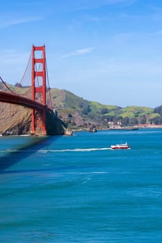 Golden Gate bridge with beautiful blue sky landscape in San Francisco in North California USA West Coast of Pacific Ocean, United States Landmark Travel Destination and cityscape concept.