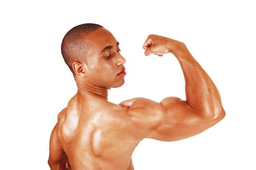 A young handsome man in a close up image flexing his biceps after a.workout with weight, isolated for white background.