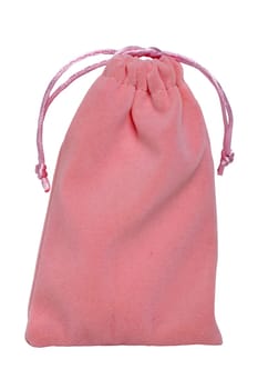 Closeup of a pink fabric gift drawstring bag or cloth bag isolated on a white background. Macro photograph with copy space.